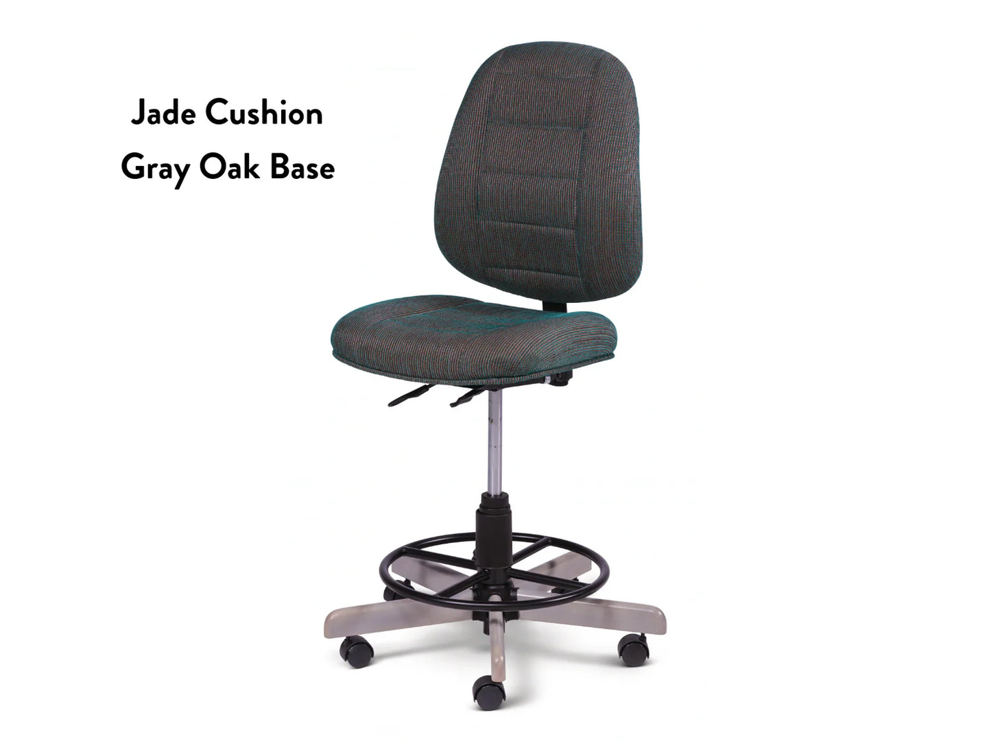 The Koala SewComfort Chair features a jade-colored cushioned seat and backrest, adjustable height, foot ring, and a gray oak five-wheel base—ergonomic for long crafting. "Jade Cushion Gray Oak Base" is printed on the left side.