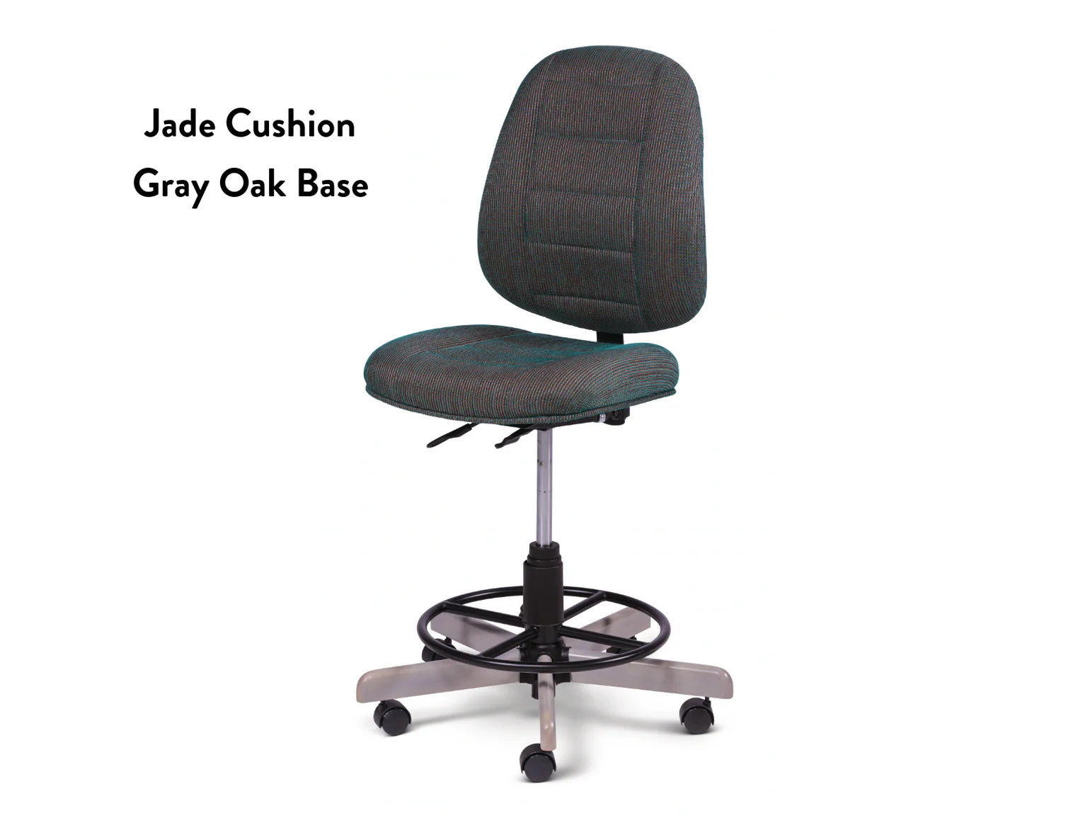 The Koala SewComfort Chair features a jade-colored cushioned seat and backrest, adjustable height, foot ring, and a gray oak five-wheel base—ergonomic for long crafting. "Jade Cushion Gray Oak Base" is printed on the left side.