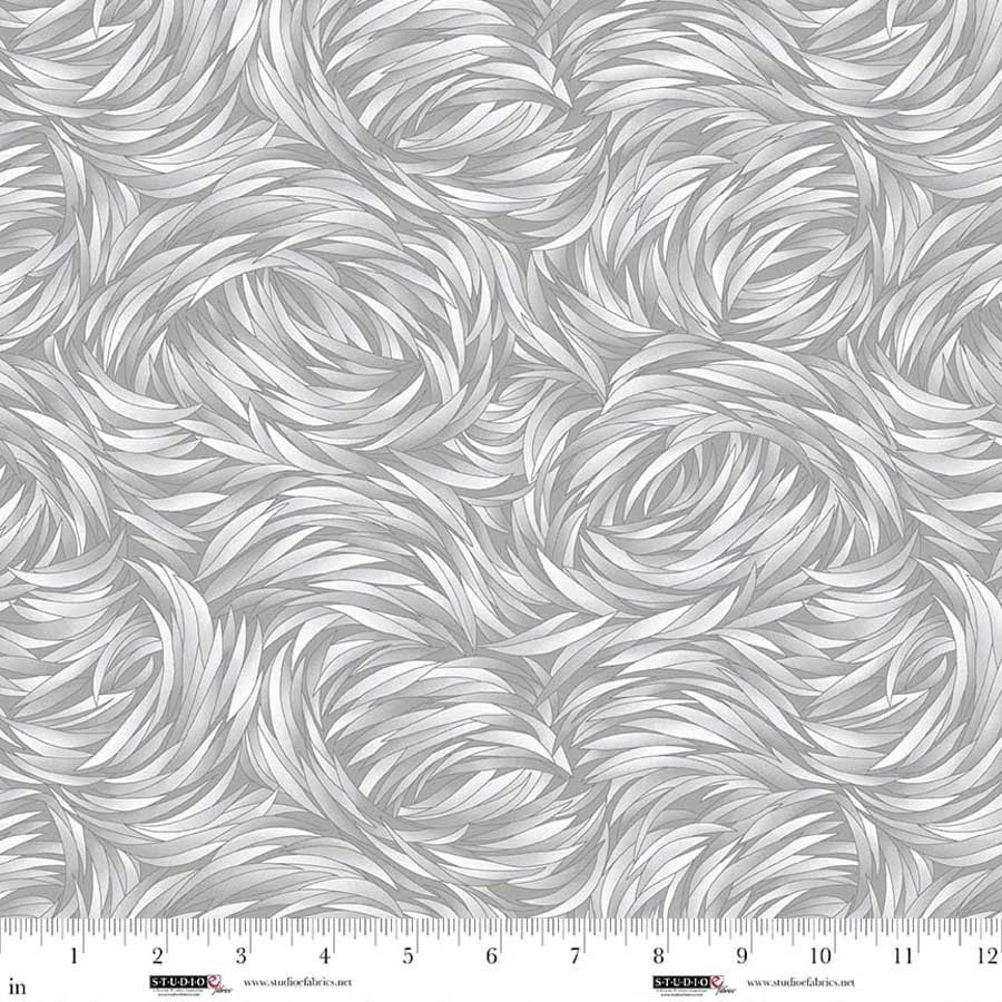 QT Fabrics’ Tempest Silver Swirl 108" Wide Quilt Backing Fabric features a gray and white abstract feather or leaf pattern on premium quilting cotton, ideal for quilt backing, with measurements in inches from 0 to 12 shown at the bottom.