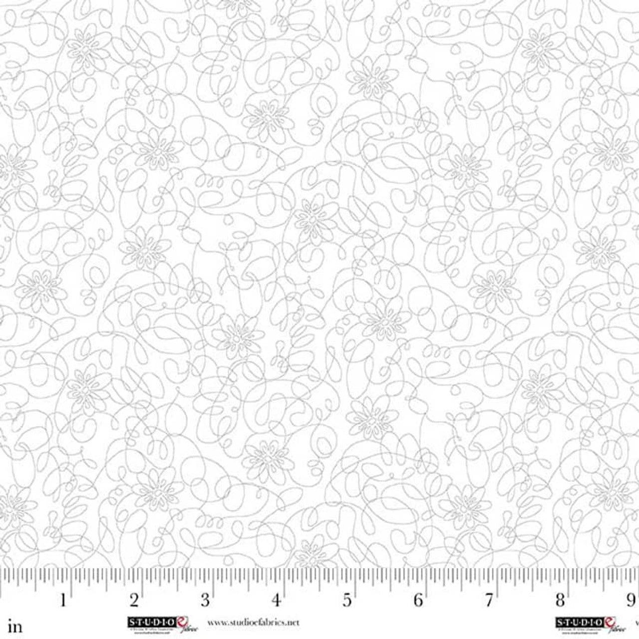 Best of Cream & Sugar White on White Modern Art Floral Fabric Yardage by Jaftex - Studio E features a subtle light gray floral and vine print. Perfect quilting cotton for modern projects; ruler at the bottom shows inches for precise measuring.