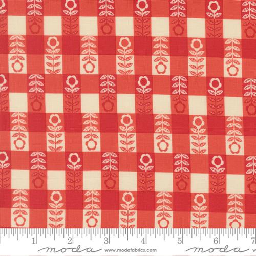 The Henhouse Flower Plaid Checks and Gingham Barn Fabric Yardage by United Notions features red and cream gingham with white and red floral rows. A ruler shows inch scale, ideal for quilting cotton projects.