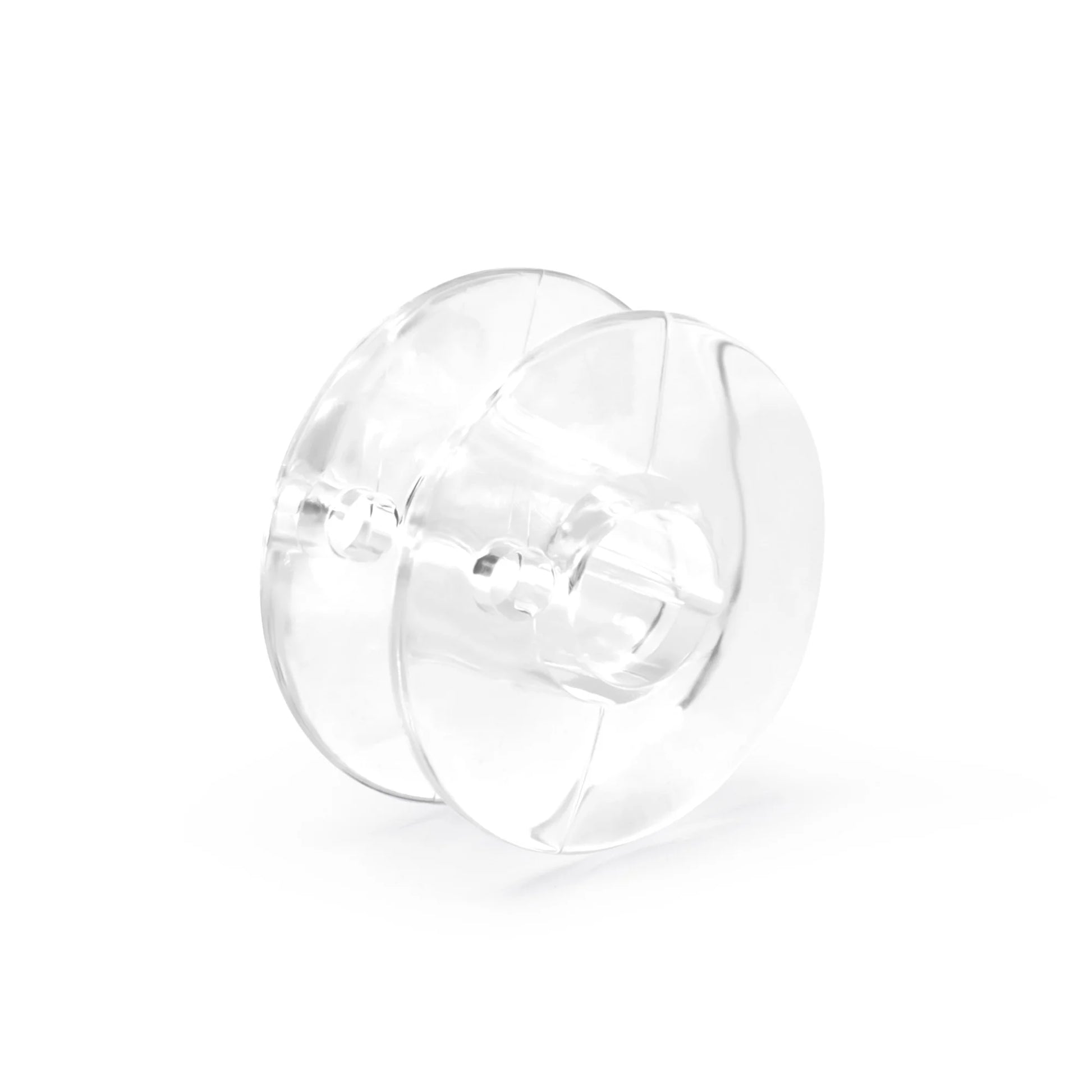 A clear plastic Class 66 bobbin from the Dritz 12 Count set by Checker Distributor, featuring two flat sides and a cylindrical center, shown on a white background.