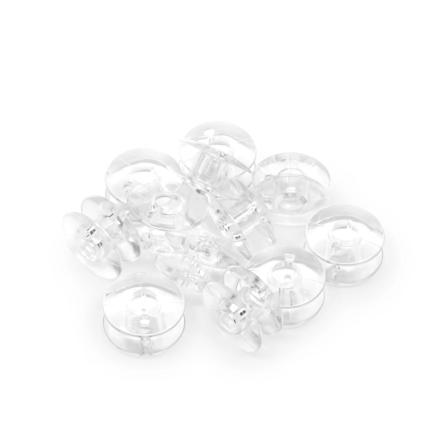 Dritz 12 Count Plastic Class 66 Bobbins by Checker Distributor are shown scattered in a pile on a white background.