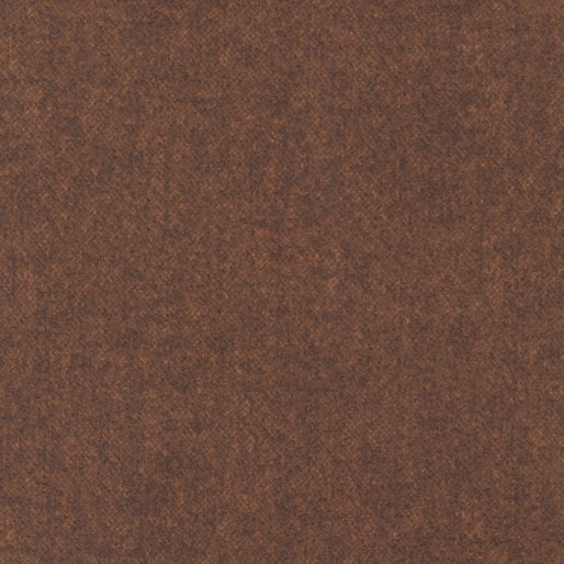 A close-up of Benartex's Winter Wool Fudge Flannel Fabric Yardage shows a textured brown surface with rich, even color and subtle tonal variations, evoking the look of rustic quilt fabric or suede.