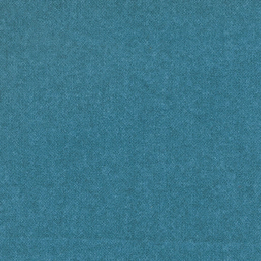 Benartex Winter Wool Lagoon Flannel Fabric Yardage features a solid teal blue, slightly grainy textured surface reminiscent of quilting fabric or paper.