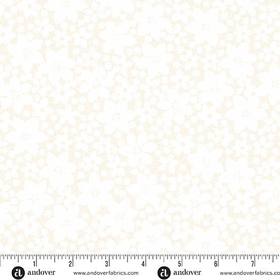 Soft blue cotton quilting fabric with a delicate floral pattern from the Andover Color Me Whispered collection. A measuring tape at the bottom shows width in inches, with andoverfabrics.com printed below.
