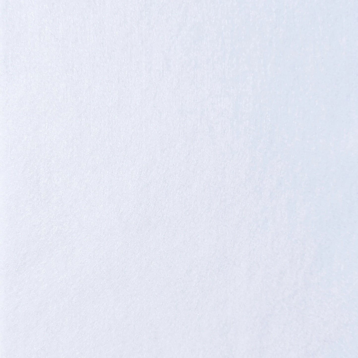 Close-up view of 72in Acrylic White Felt Yardage, featuring a blank white textured surface with subtle grain and shading variations—ideal as a versatile crafting material.