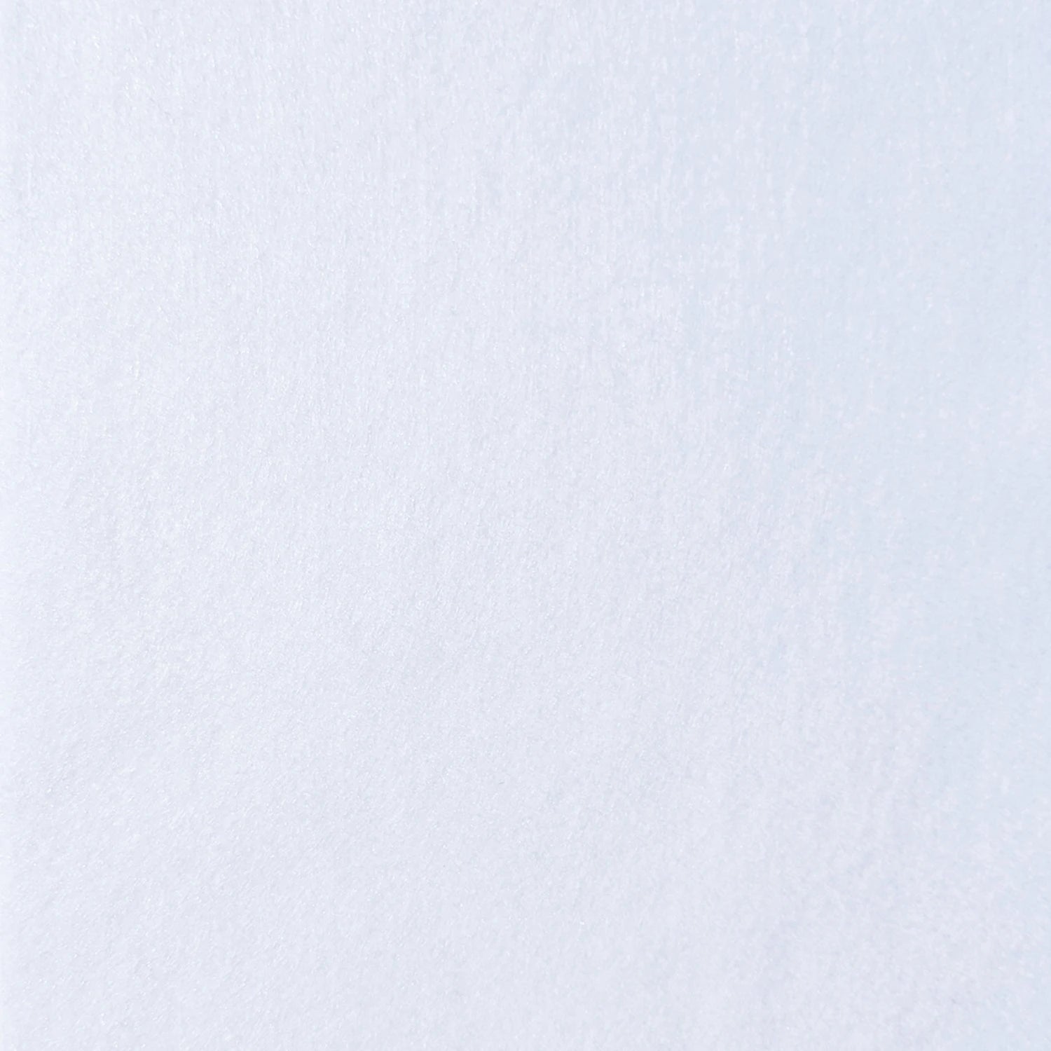 Close-up view of 72in Acrylic White Felt Yardage, featuring a blank white textured surface with subtle grain and shading variations—ideal as a versatile crafting material.