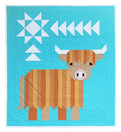 Cattle Call - A Highland Coo Quilt Pattern features a geometric brown and orange Highland cow on a bright blue background with white triangles and a star in the corner—a cozy farmhouse quilt design for any space.