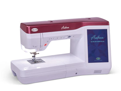 The Baby Lock Anthem Sewing & Quilting Machine features a white body, maroon top, large digital screen, and advanced StitchSync Regulation for precise stitching. Includes FREE 60 days of online classes.