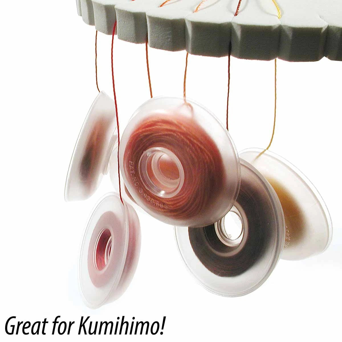 Checker Distributor Bob-EEZ, 1-7/8" diameter (8 per bag), keeps threads securely in place on a kumihimo disk for neat cord management when braiding. Great for Kumihimo! The organized setup highlights excellent thread storage.