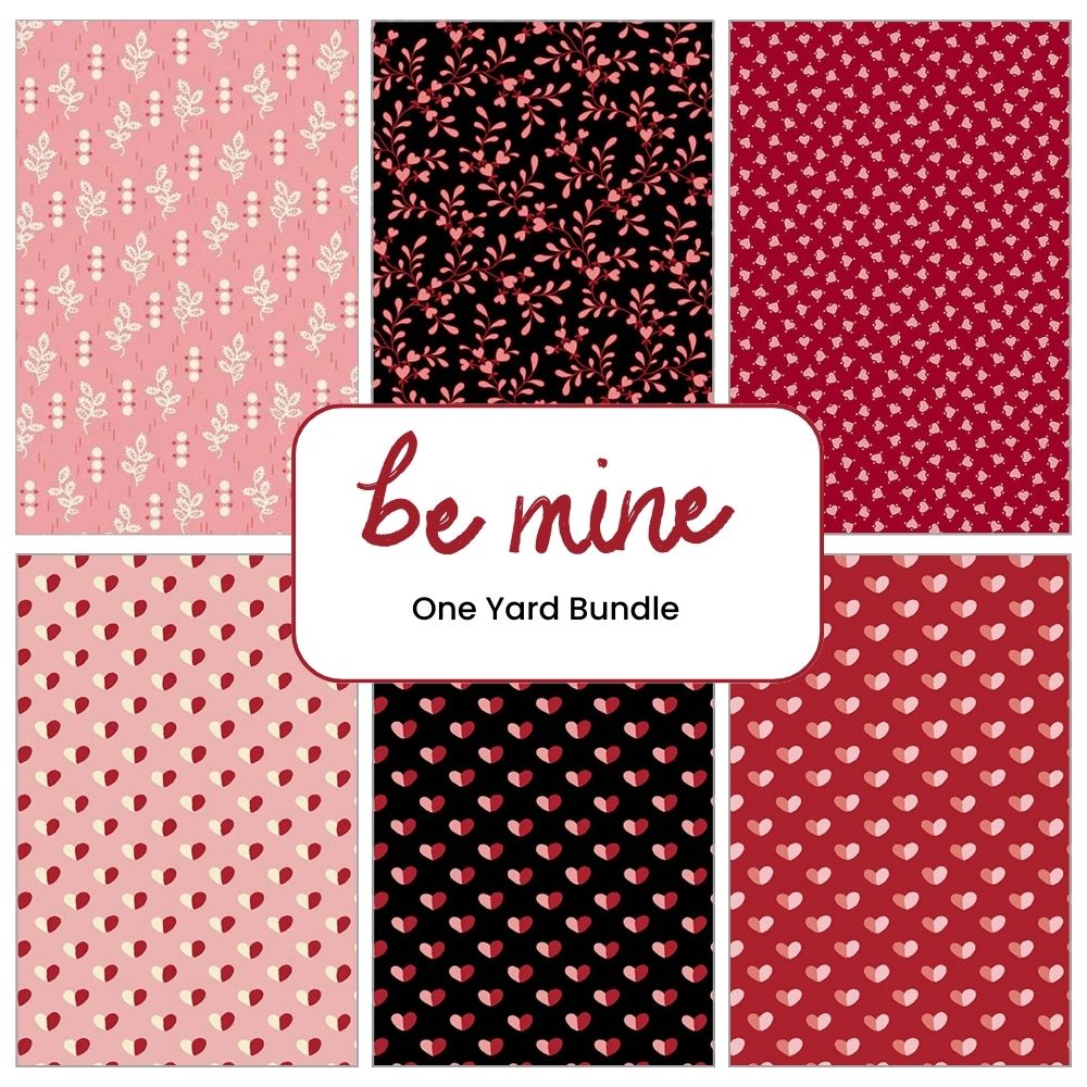 A collage showcases six Valentine’s Day fabrics in pink, red, and black with hearts and florals. At the center: Be Mine One Yard Bundle by Andover—a convenient fabric bundle of one-yard cuts.