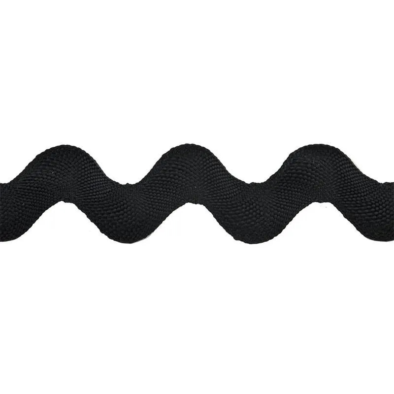 A close-up of Rick Rack 1-1/4" Wide black polyester trim with a wavy zigzag pattern on a white background, ideal for sewing embellishments.
