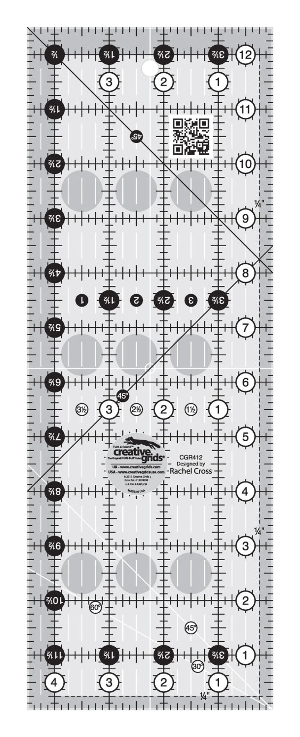The Checker Distributor Creative Grids Quilt Ruler (4½" x 12½") features clear construction, black measurement markings, grid lines, angle guides, and a QR code—ideal for accurate fabric cutting in quilting projects.