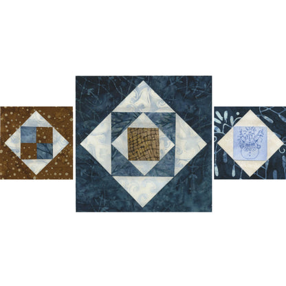Three geometric quilt squares in different sizes. The center, pieced in blue, white, and brown, is trimmed using the Checker Distributor Creative Grids Square on Square Trim Tool 4in or 8in Finished Blocks Quilt Ruler for accuracy.