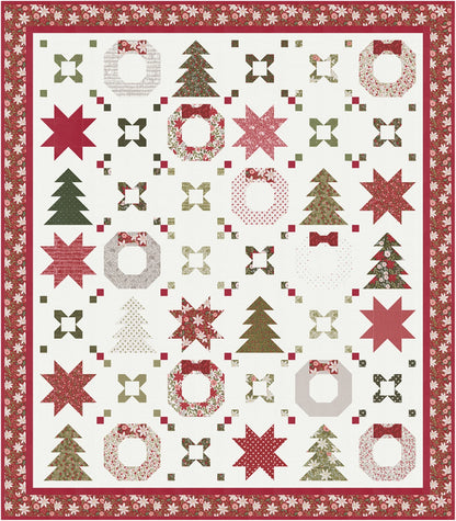 The Holiday Connections Quilt Pattern by Coach House Designs features festive stars, wreaths, trees, and bows in red, green, and cream fabrics arranged in a grid on white, framed with a vibrant red and white floral border.
