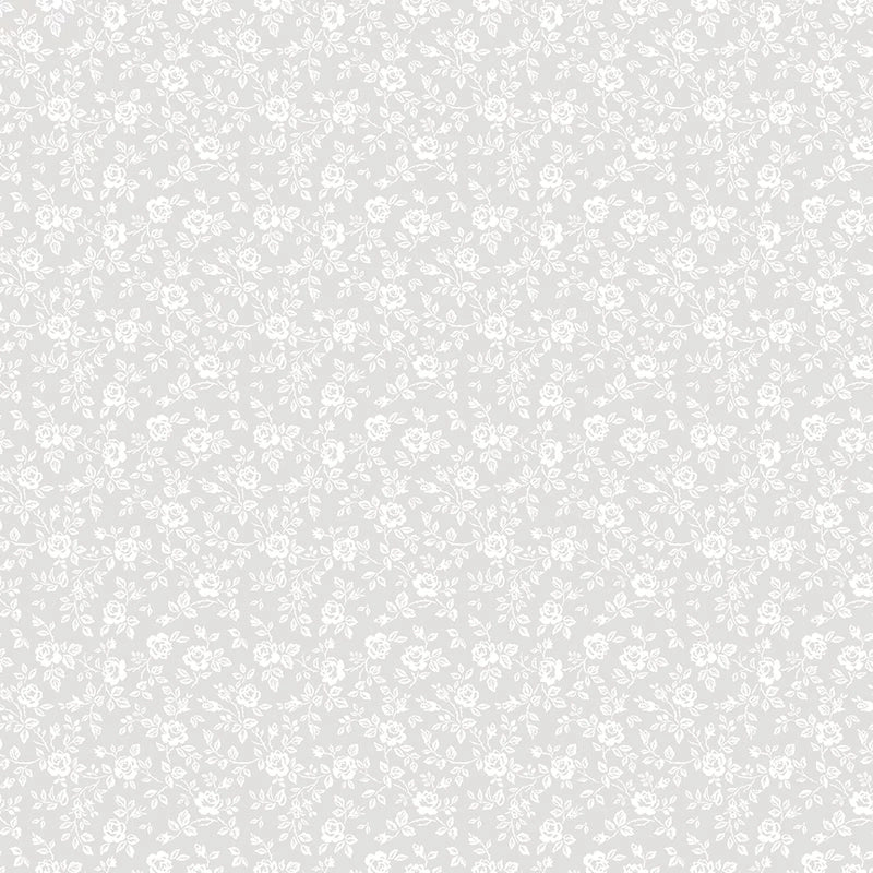 Elegant Essentials Small Floral White Pearl Fabric Yardage by Riley Blake features a light gray background and delicate, repeating white flowers, leaves, and vines in a subtle diagonal pattern—perfect for timeless, elegant projects.