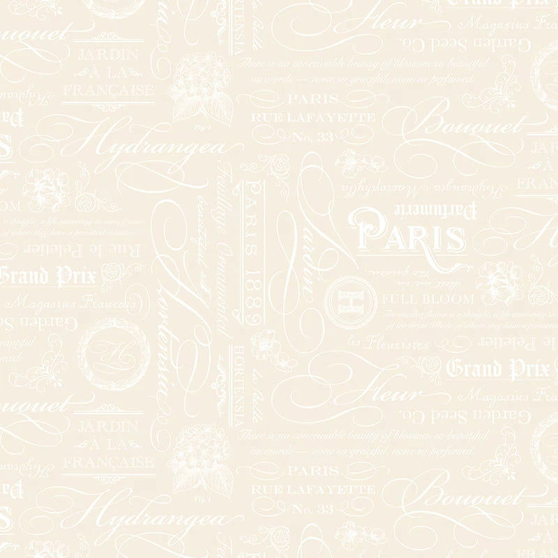 Elegant Essentials Text Cream Pearl Fabric Yardage by Riley Blake features cream-colored wallpaper-inspired fabric with vintage French script, white botanical illustrations, floral motifs, and words like PARIS and Bouquet in a repeating pattern.