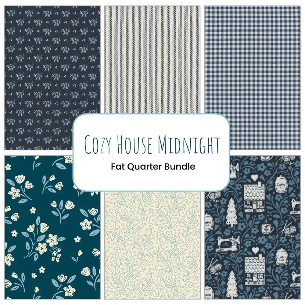 A collage of six blue and cream fabric patterns—florals, stripes, gingham, and house motifs—features the Andover Cozy House Midnight Fat Quarter Bundle labeled at the center.