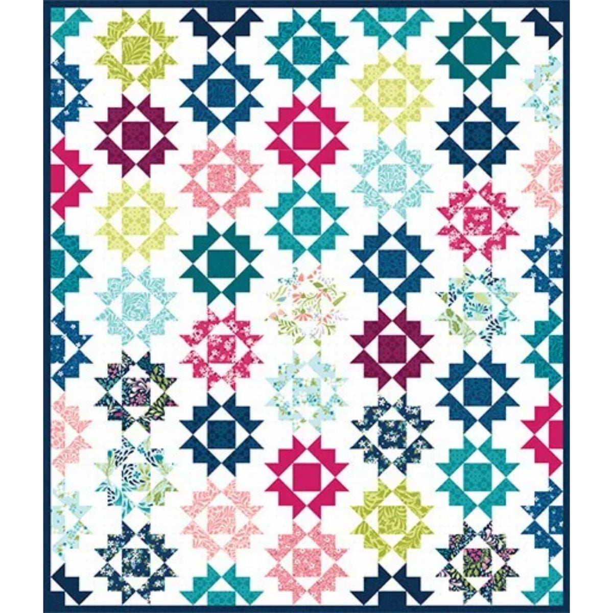 Crocuses quilt kit completed quilt with jewel-toned star blocks on white background
