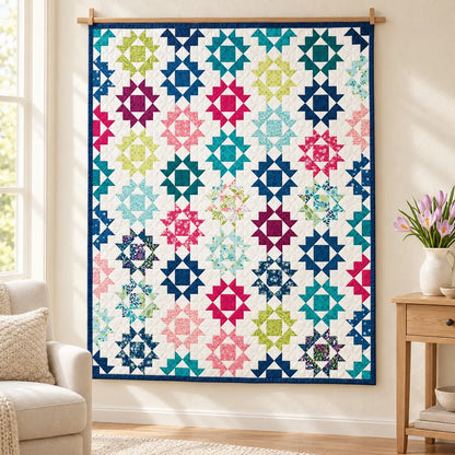 Crocuses quilt kit hanging on wall colorful star blocks pink teal green navy border