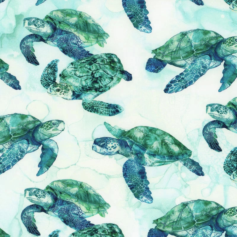 Coral Reef White Multi Turtles Fabric Yardage by Northcott features green sea turtles swimming on a pale blue and white watercolor-like background—ideal for children's quilts, with detailed shells and flippers for an aquatic look.