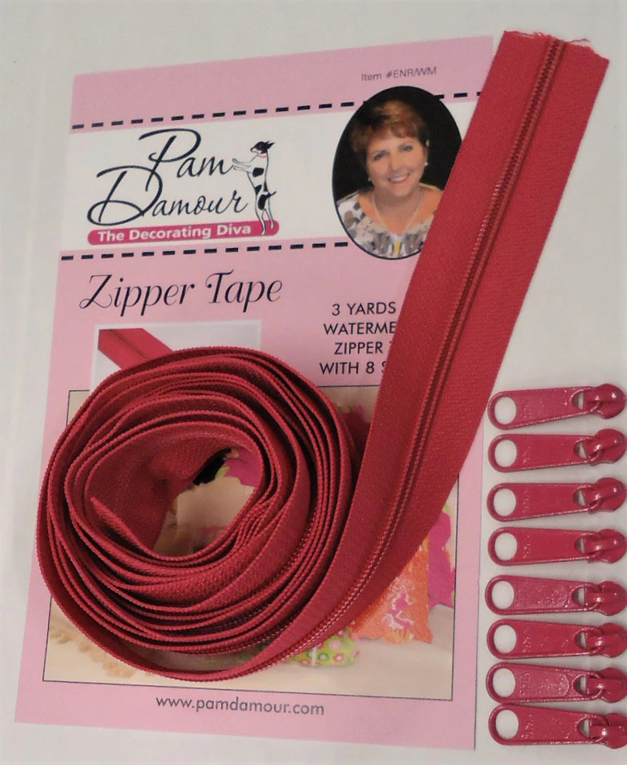 A package labeled Checker Distributor Reversible Coil Zipper Tape 3yds Watermelon 8 Slides includes a rolled watermelon-colored zipper tape and eight matching slides, ideal for handbags. The packaging features Checker Distributor branding.