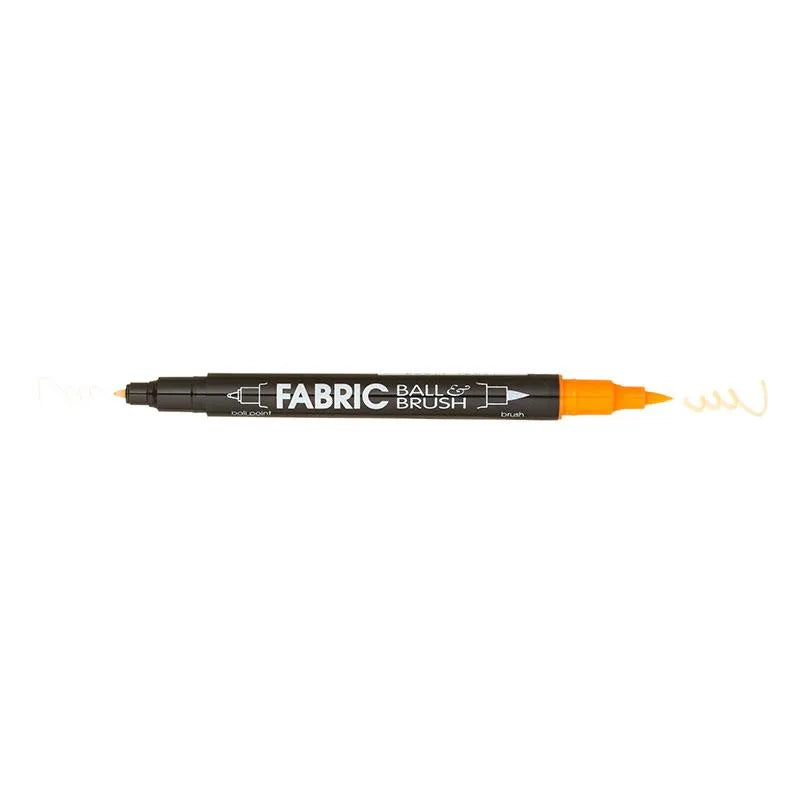 The United Notions Marvy Fabric Ball & Brush Marker features a black body and dual tips—a black fine tip and an orange brush tip—each drawing squiggly lines, perfect for versatile, permanent fabric marking.