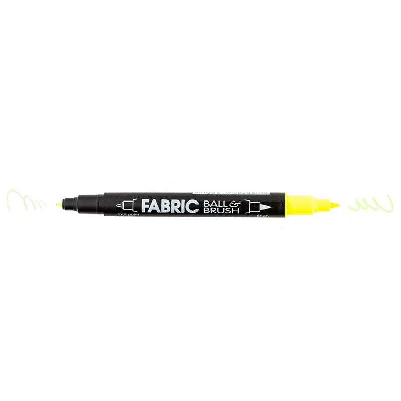 The Marvy Fabric Ball & Brush Marker by United Notions features a black body labeled FABRIC BALL & BRUSH, a yellow cap on one end, and yellow lines from each tip to show both line styles.