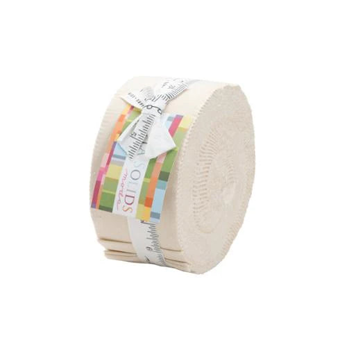 A roll of United Notions' Bella Solids Natural Jelly Roll, wrapped with a colorful, rectangular-pattern label reminiscent of classic quilting designs, is displayed against a plain white background.