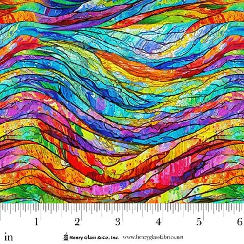 Faith in Full Color Wavy Stained Glass Fabric Yardage by Jaftex - Henry Glass Fabrics features wavy, overlapping lines in blue, green, yellow, orange, red, and purple with a ruler showing inches along the bottom edge.