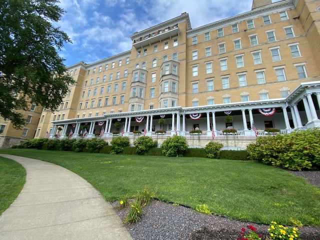 French Lick Resort porch with rocking chairs and white columns