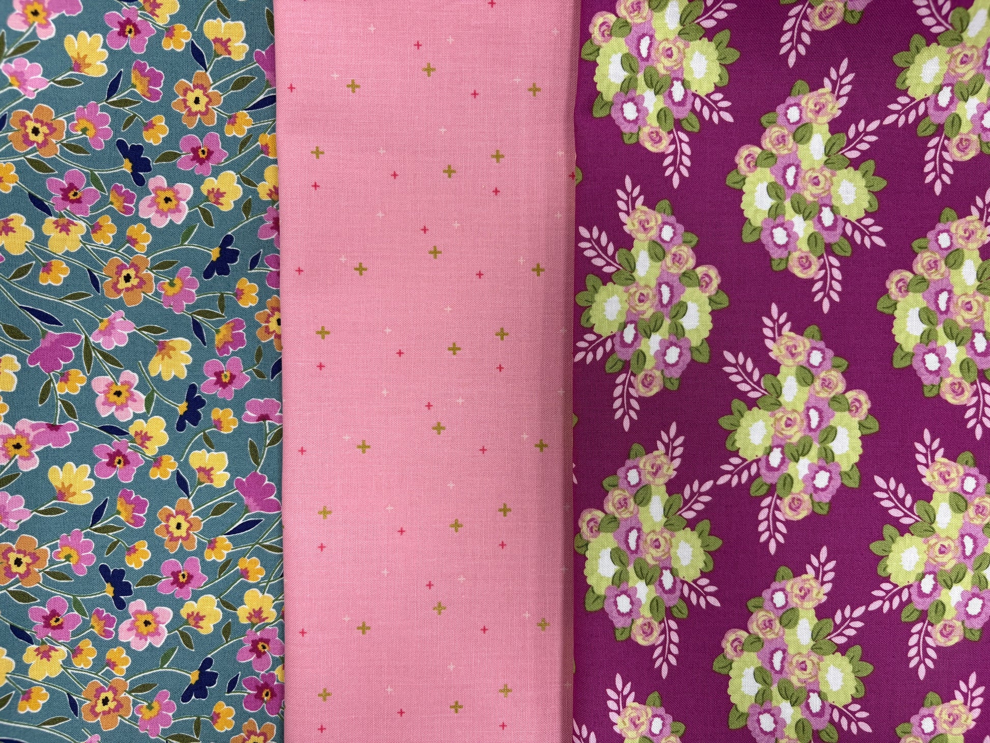 The Morning Meadow Dusk Flower 3 Yard Quilt Top Bundle by Quilted Joy features blue floral, pink cross, and dark purple floral cotton fabrics—perfect for your next quilting project.