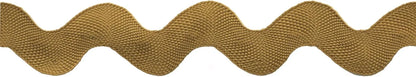 A close-up of Rick Rack 1-1/4" Wide in gold polyester, featuring evenly spaced wavy curves on a white background—ideal as a sewing embellishment.