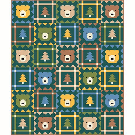 The Grizzly Grove Quilt Kit - PRESALE by Quilted Joy features a geometric pattern of bear faces and pine trees in green, brown, blue, and yellow, bordered with checkered and zigzag designs—perfect for summer quilt projects.