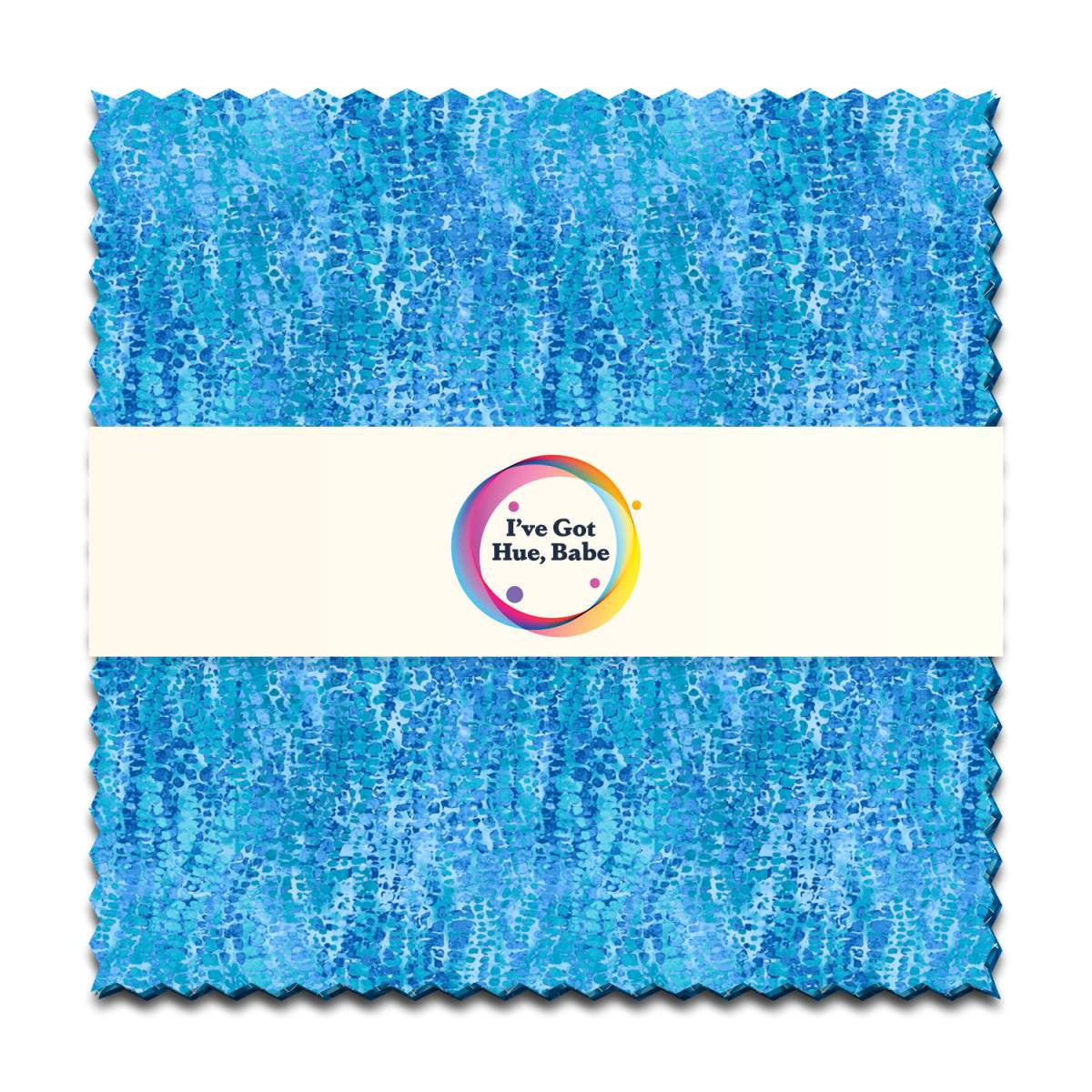 The Jaftex - Henry Glass Fabrics "I've Got Hue, Babe Turquoise Waves" charm pack features 5" precut turquoise fabric squares with zigzag-cut edges, a white center band, and a colorful circular logo.