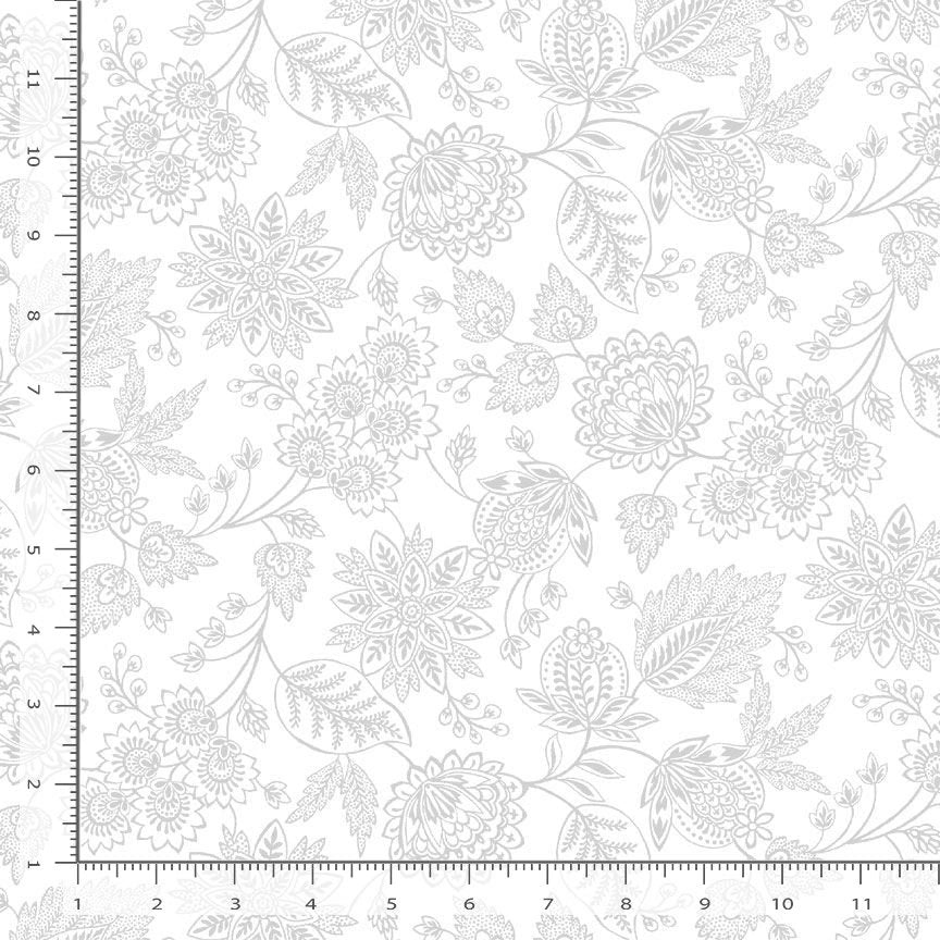 Whiteout White Jacobean Floral Fabric Yardage by Timeless Treasures showcases a light gray floral and leaf pattern on white. Ruler markings show scale, making this tonal quilting cotton perfect for low-volume, subtle quilt designs.