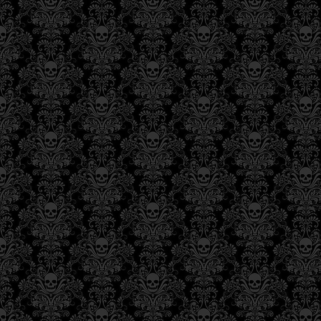 Blackout Black Skull Damask Fabric Yardage by Timeless Treasures features ornate, symmetrical skull and floral motifs in black and gray—perfect for elegant gothic quilting or decor projects.