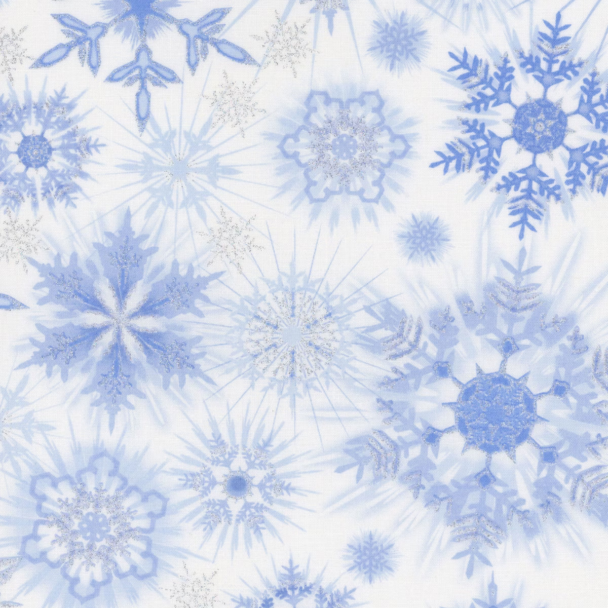 Ice Snowflakes Glitter Frost Metallic Fabric Yardage by Timeless Treasures features shimmering blue and white snowflakes of various sizes on a white background, making it perfect for winter-themed, cozy creations.