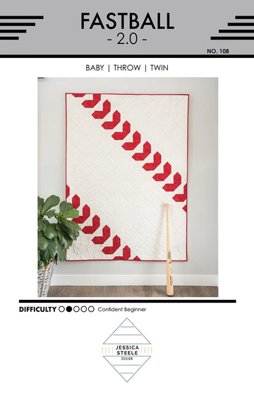 Fastball 2.0 quilt pattern cover with red and white baseball stitch design by Jessica Steele