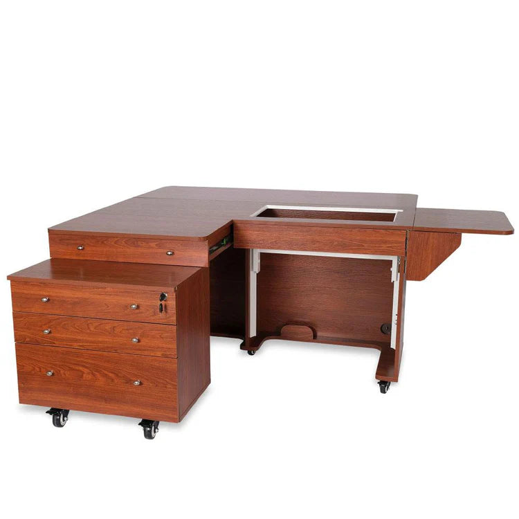 The Kangaroo & Joey Cabinet Set (available in 3 colors) is an L-shaped desk with a matching three-drawer rolling cabinet, slide-out extension, and open space for a chair or sewing machine. Both pieces feature polished wood with visible grain.