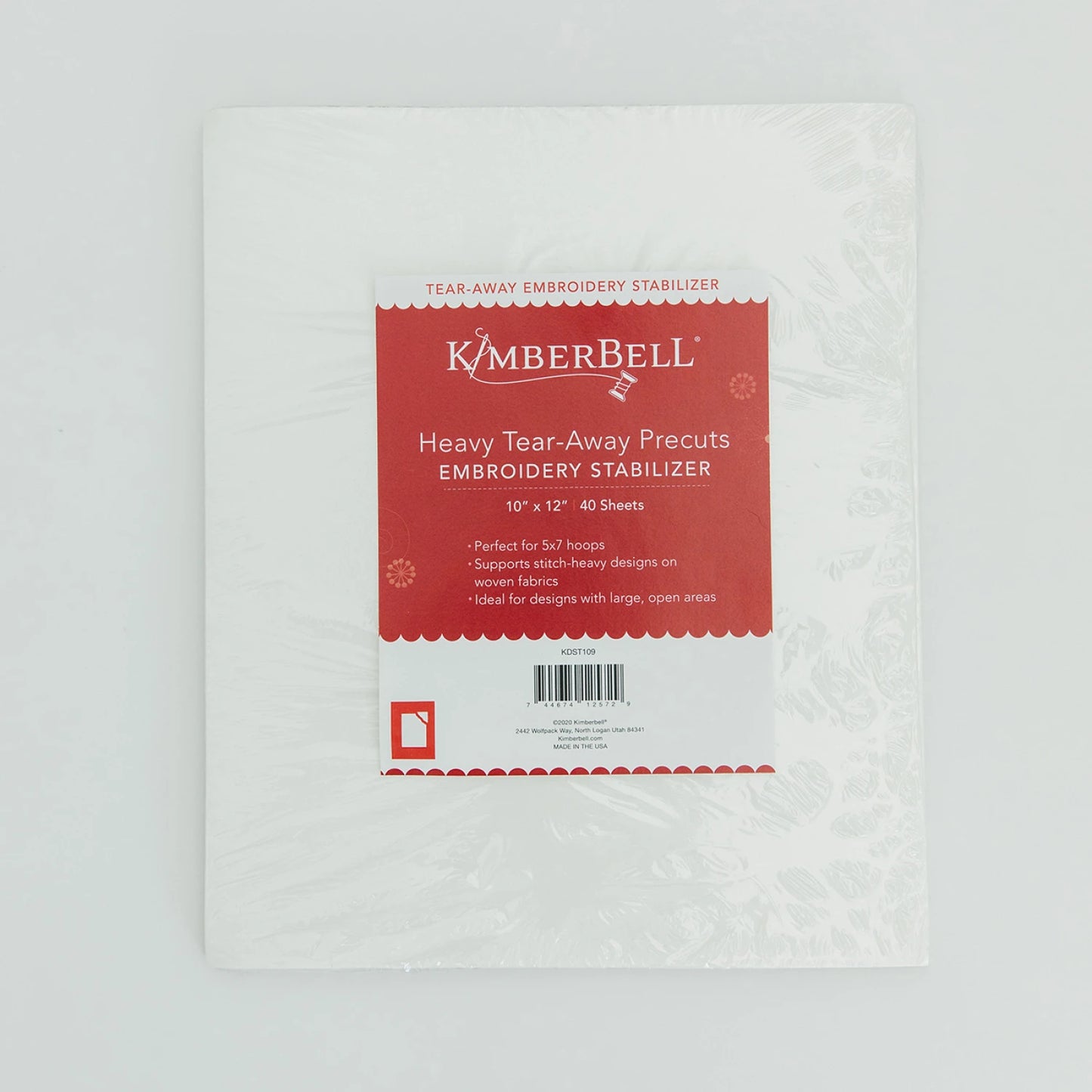A package of Checker Distributor Kimberbell Heavy Tear-Away 12in x 10in Pre-cuts 40pk with a red and white label is shown against a white background.