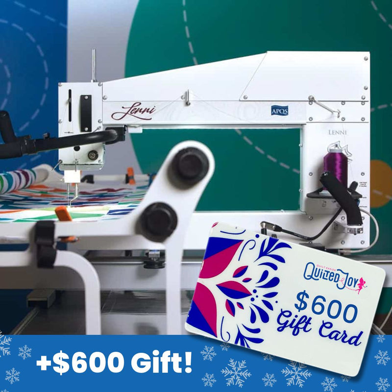 A longarm quilting machine is stitching a colorful quilt. In the foreground, there is a $600 Quilted Joy gift card. The bottom banner reads +$600 Gift! with snowflake icons.