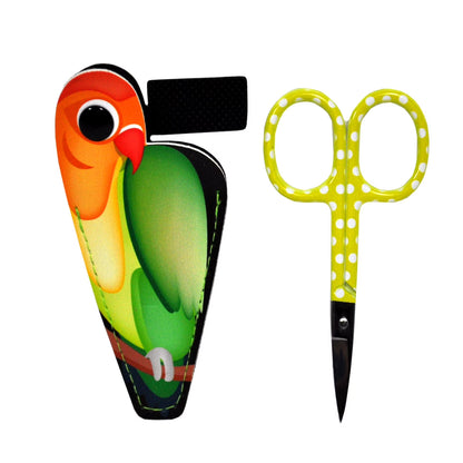 The Baby Lock Purse Parrot Embroidery Scissors with PU Pouch feature yellow polka-dotted stainless steel blades and come with a parrot-shaped case—green body, orange head, black eye—for a charming touch to any sewing kit.