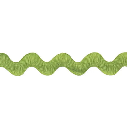 A close-up of Rick Rack 1-1/4" Wide, a green sewing embellishment with a wavy zigzag pattern, displayed on a white background.