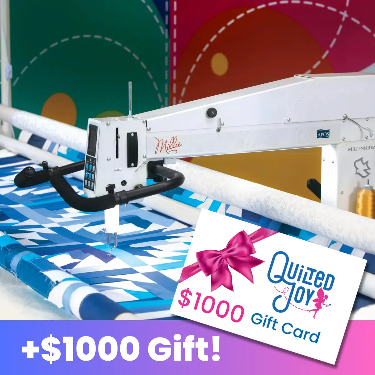 The APQS Millie 26" Quilting Machine with Deluxe Bliss Frame stitches a blue and white patterned fabric; a $1000 Quilted Joy gift card with a pink bow is in the foreground. Text below reads: +$1000 Gift!.