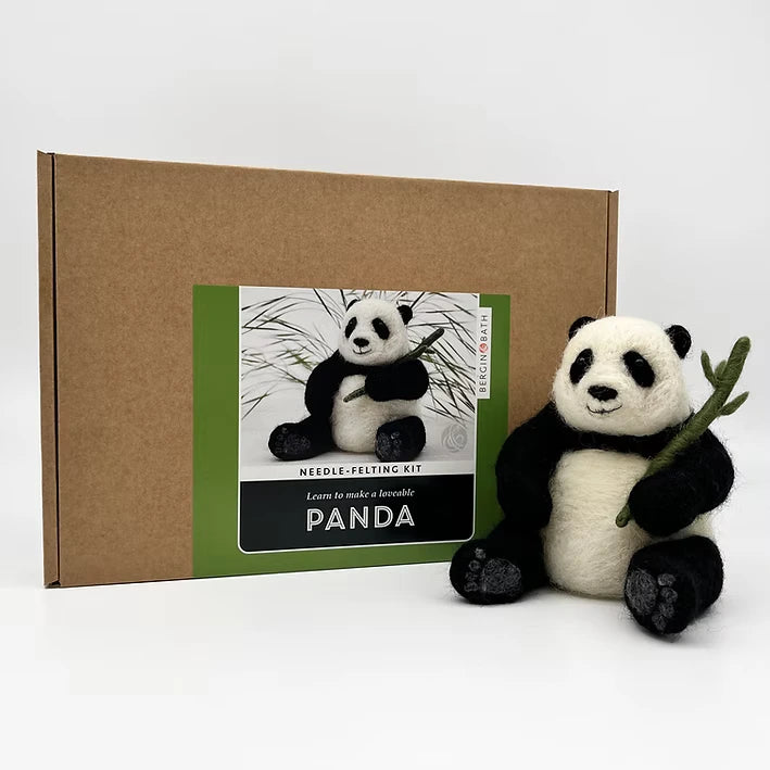 The Panda Needle Felting Kit box, featuring a felted panda image, is shown beside a completed wool felt panda holding bamboo, all on a white background—an ideal needle felting kit for beginners.