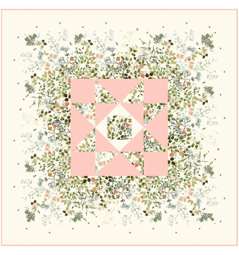 Quilt with floral pattern and pink square in center on beige background