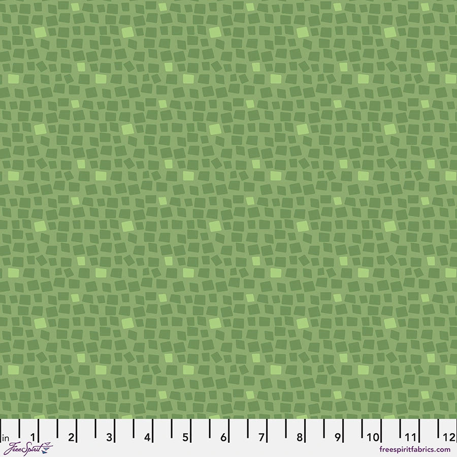 Chromatics Olive Stepping Stones Fabric Yardage by Jaftex - FreeSpirit features a green mosaic pattern with overlapping squares in various shades of green and a ruler marked 1-13 inches—ideal for modern quilting projects.