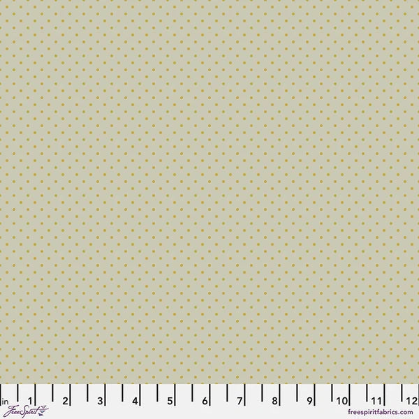 Vintage Cloth Brook Chateau Fabric Yardage by Jaftex - FreeSpirit is a light beige cotton with small yellow dots, perfect for quilting. It includes a white measuring ruler in inches along the bottom edge.
